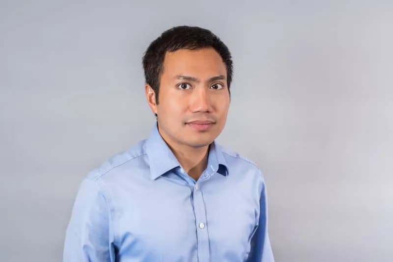 Professional headshot of Phyo Win